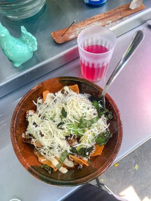 Chilaquiles pasilla y morita con barbasoya  y agua del día   at Mandragora Vegan in Mexico City
