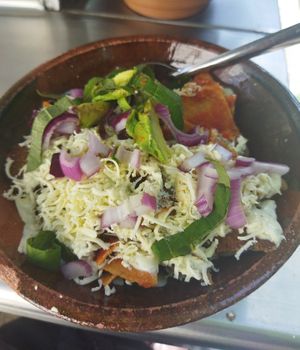 Chilaquiles rojos con milanesa 💚 at Mandragora Vegan in Mexico City
