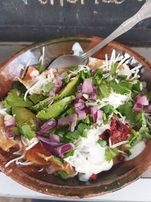 Chilaquiles rojos con chorizo at Mandragora Vegan in Mexico City