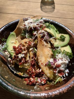 Chilaquiles (half eaten)  at Mandragora Vegan in Mexico City