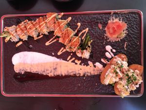 Spicy Geisha Roll, Salmon and Avocado Inari Boats  at Salmoon in Miami