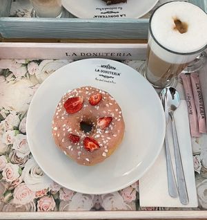 Strawberry donut and almond milk latte  at La Donuteria in Budapest