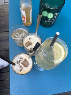 iced latte with oat milk and limoncello spritzz  at Cafe Lozzi in Munich