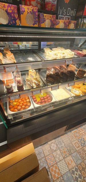 Cakes labelled vegan at Lily's Deli - Ancoats in Manchester