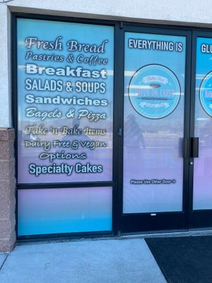 sign on the door which lists items they have at Haven On Earth Bakery & Deli in Reno