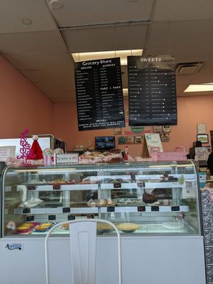 Case and signs with clearly labeled dairy free/vegan options at Haven On Earth Bakery & Deli in Reno