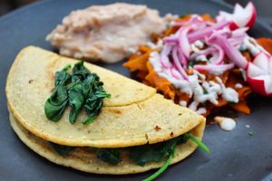 Vegan omelet of chickpeas chilaquiles and chilaquiles with a sunflower cream  at Northswell Sabor Natural in Sayulita