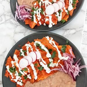 Vegan chilaquiles with beans and a sunflower cream  at Northswell Sabor Natural in Sayulita