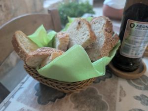 An assortment of homemade breads at O Linós in Paphos