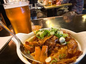 Vegan poutine with west coast IPA  at Korrigane Brasserie Artisanale in Quebec