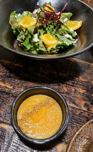 Soup and salad that come with a meal set at Kkot Bape Pida - 꽃 밥에 피다 A Flower Blossom on the Rice in Seoul