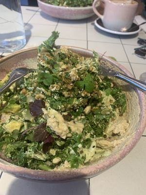 Green Bowl w/ Hummus, Kale, Broccolini, Buckwheat, Almonds, Avocado, Herbs, Pickled Cucumber, Green Tahini Dressing, Dukkha   at Nine Yards in South Melbourne