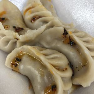 Tofu veg dumplings with chilli sauce  at Nen Bei Dumpling Tea Bar in Newcastle Upon Tyne