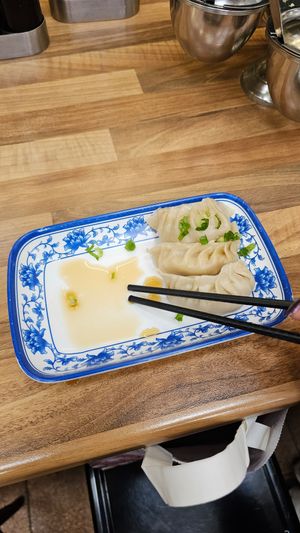 Tofu vegetable dumplings with soy sauce and green onions. at Nen Bei Dumpling Tea Bar in Newcastle Upon Tyne