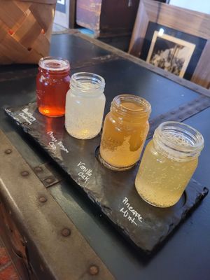 Kombucha sampler to sip on via main house alongside our food. at Buku Vegan - Pop Up in Winter Garden