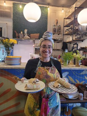 Chef Chicoye bringing out her fabulous breakfast burritos! at Buku Vegan - Pop Up in Winter Garden