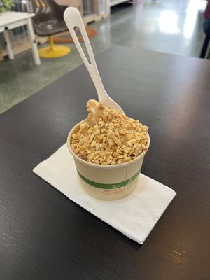 Vanilla soft serve with maple peanut butter sauce and peanuts    at MÜ in San Juan