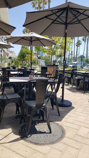 Outdoor seating with view of marina at Active Culture in Long Beach
