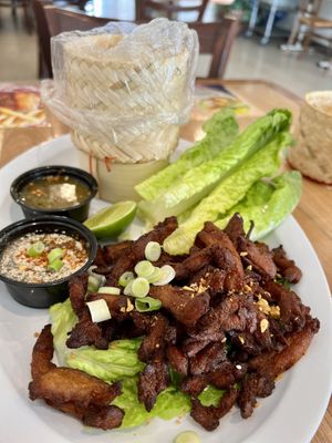 Vegan beef jerky with sticky rice.  at Teacoffhut in Los Angeles