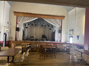 Theatre is part of the place. They have patio seating too  at Studio Pizza in Hancock