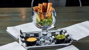 Flautas made with Impossible ground beef. 
Served with house made Vegan Queso and house made Guacamole.  at Torque Grill & Cantina in Burleson