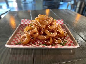 Vegan Onion Rings 
With Vegan Ranch at Torque Grill & Cantina in Burleson