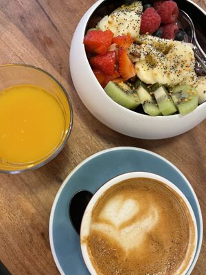 Acai bowl and oat milk coffee  at umami in Madrid