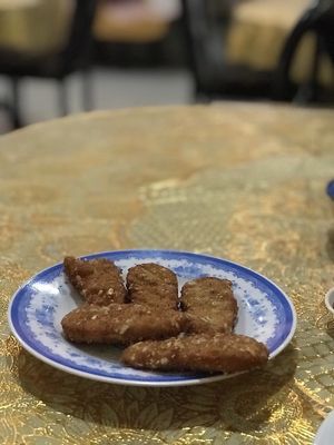 Seitan appetizer. Different from menu picture. From a bag, probably not worth it unless you're craving them. at D'Vegan in Dallas