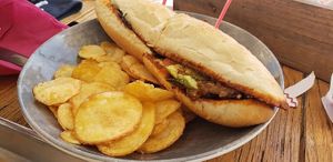 Calabacitas (their specialty tortas) charred zucchini with tomato, bean puree, avocado, guajillo chili sauce. at Señor Pico in Dubai