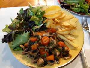 Mushroom and tomato saute with homemade fries and salad at Surviaria in Amarante