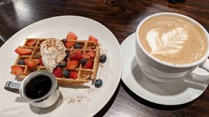 Sweet waffles and a large oat milk latte at Botanical Plant-Based Fare in Charlottesville