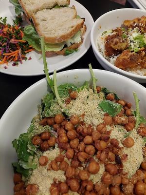 Chickpea croutons on kale Caesar salad, cauliflower bites, mushroom bacon BLT at Botanical Plant-Based Fare in Charlottesville