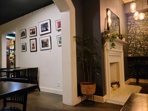 Displayed art for sale. at Botanical Plant-Based Fare in Charlottesville