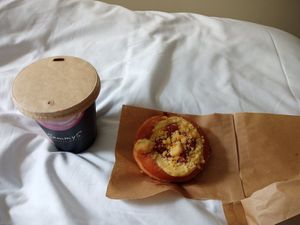 Oat milk latte and strawberry and rhubarb doughnut at Sammys Berliner Donuts in Berlin