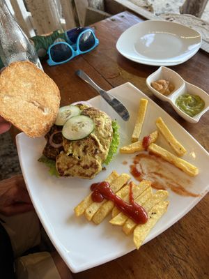 Lentil patty and soy steak on burger 🍔   at Don Sanduchito in Puerto Villamil