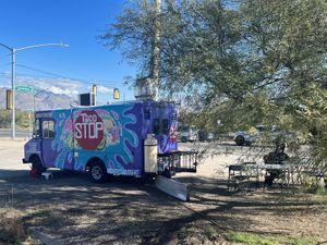Off to the side of a gas station  at Taco Stop in Tucson