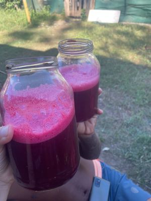 beet and pineaplle cold pressed juice at Green Hearts - Maybe closed in Coco