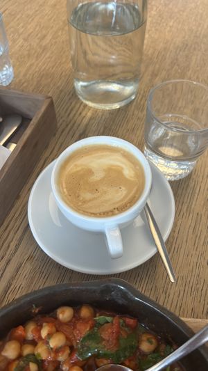 Oat milk flat whitee  at SANDHOLT in Reykjavik