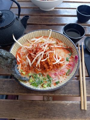 vegan tantanmen ramen - spicy, a huge portion and absolutely delicious; sencha sakura - very mild tea, I was kinda dissapointed with it. at Gyozilla Ramen in Gdansk