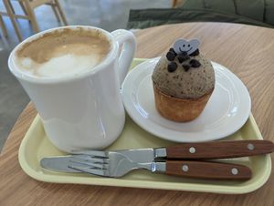 Oat milk latte and Earl Grey chocochip rise tarte. at Pan Honesta 빵어니스타 - Itaewon in Seoul