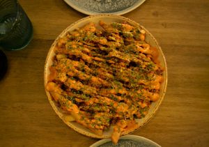 Patatas cargadas at Meet Vegano in Malaga