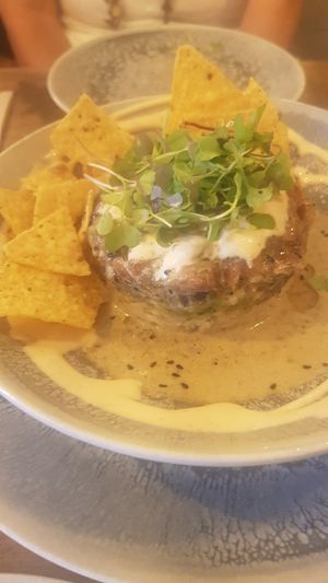 Tomate marinado con un sabor marino exquisito  at Meet Vegano in Malaga