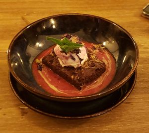 Chocolate brownie with ice cream, yum at Meet Vegano in Malaga