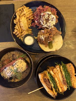 Our mains (salmon, shroom burger, meet sandwich)  at Meet Vegano in Malaga