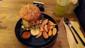 The meet Burger, with crunchy bun and chili dip. at Meet Vegano in Malaga