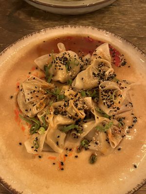 Gyoza w truffle sauce fill  at Meet Vegano in Malaga