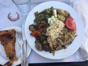 Plate by weigh and apple and raisins tart at Salsa Verde in Evora