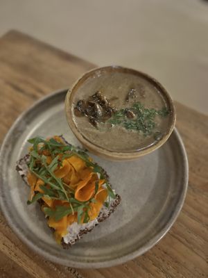Mushroom soup and cracker with lox and pilinut cheese  at Alchemy in Ubud