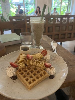 Fluffy waffle with berries and banana smoothie   at Alchemy in Ubud