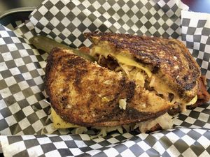Reuben sammy complete with a tasty pickle!  at Midtown Vegan Deli & Market in Tucson